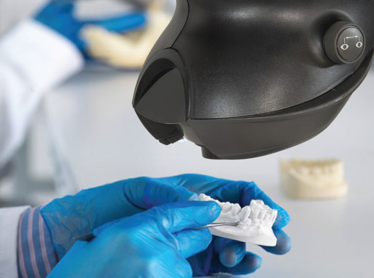 Close of dental application under OPTA stereo microscope