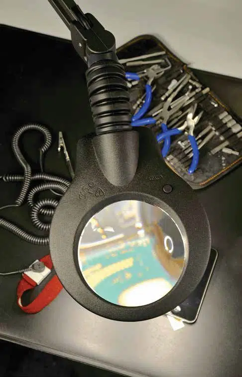 industrial_applications_image1-486×757 Vision LUXO viewing items on a work bench