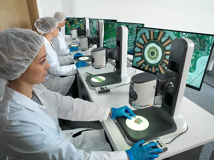 AB Vision 129-700×525 Operators inspecting PCB boards with EVO Cam II